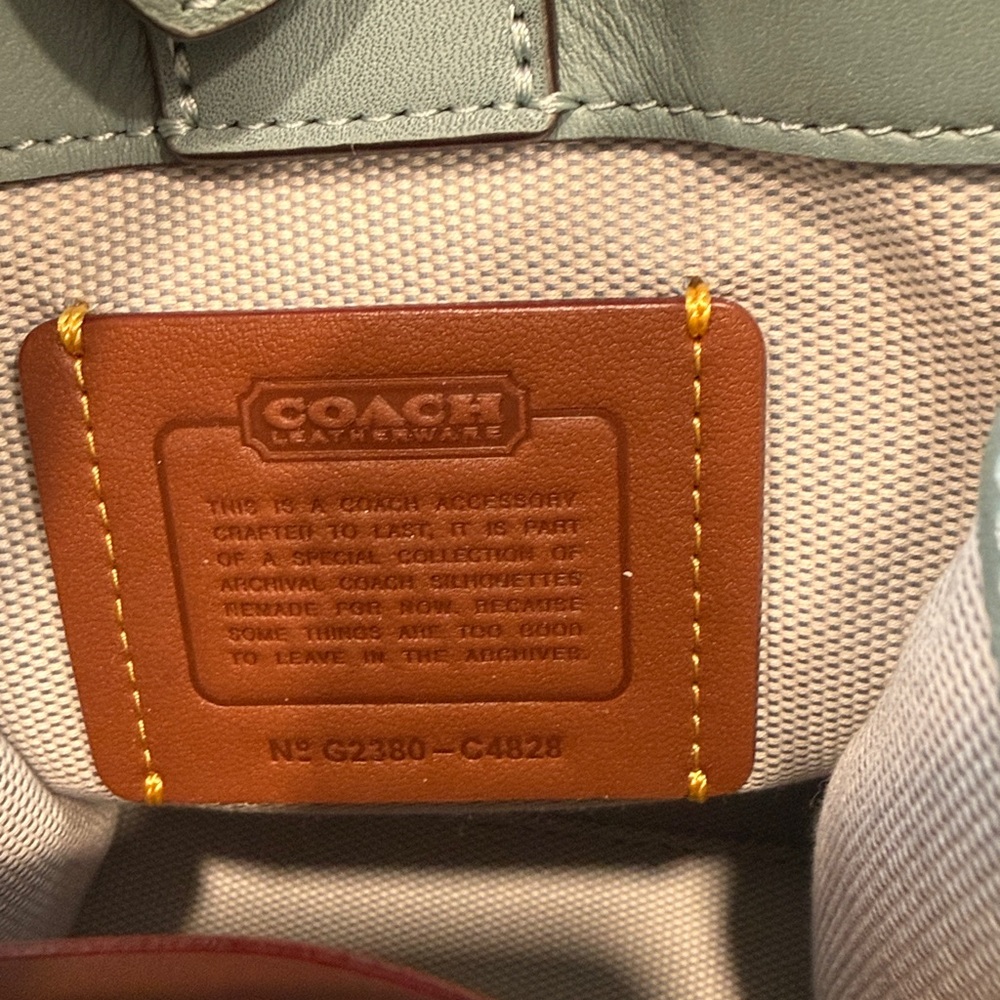 Coach Mini Teal Glovetanned
Leather Tote/Crossbody NWOT, never used - Picture 9 of 10